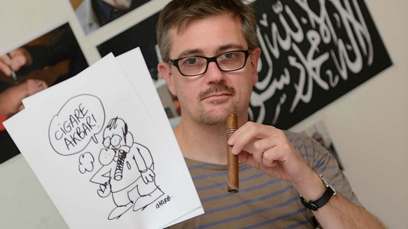 Charb, le rédacteur en chef de <i>Charlie Hebdo </i>assassiné, est accusé par Delfeil de Ton, l'un des membres de la famille du journal satirique, d'avoir «traîné son équipe à la mort».