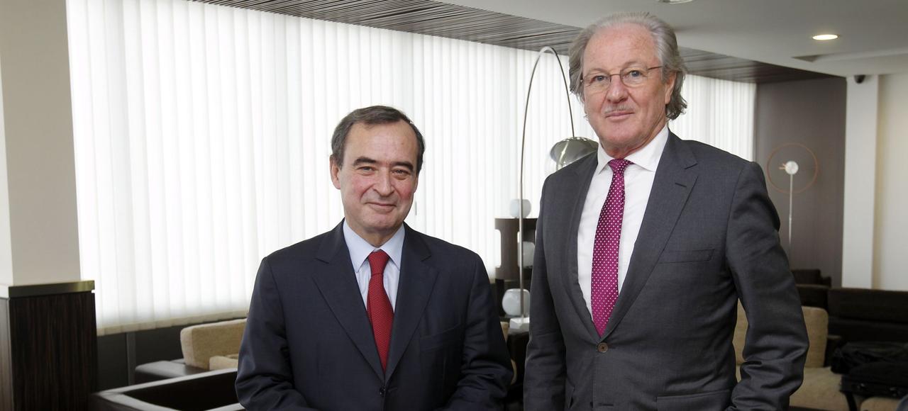 Bruno Lafont, CEO of Lafarge, and Wolfgang Reitzle, CEO of Holcim.