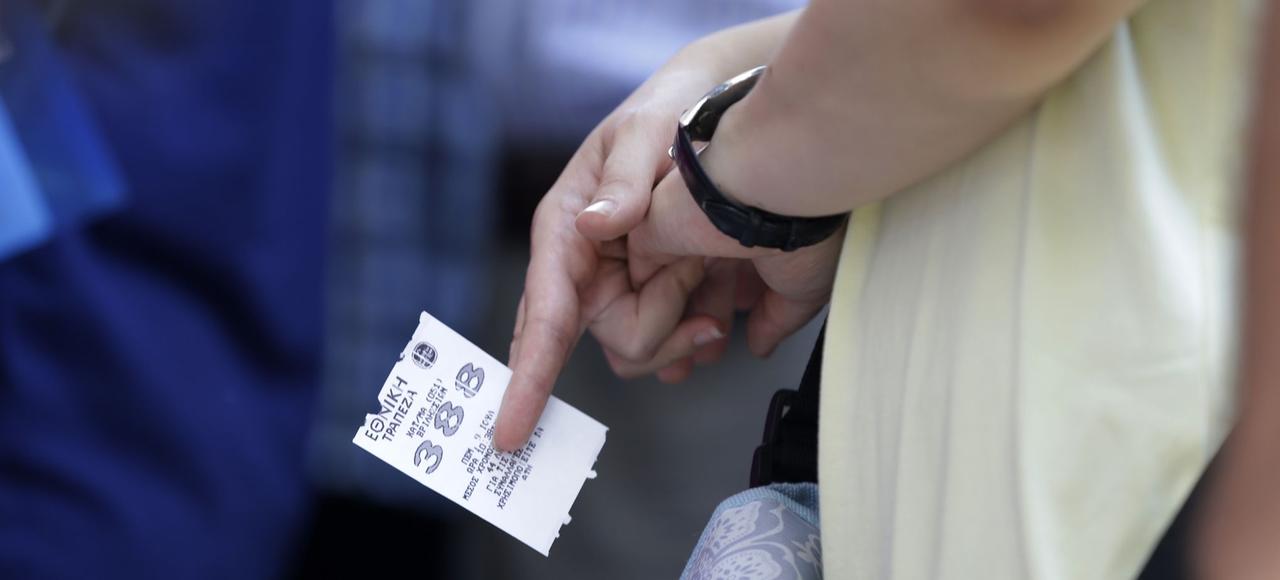 On Thursday a woman in the queue of a Greek bank Photo credit:. Thanassis Stavrakis