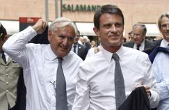 Jean-Pierre Raffarin et Manuel Valls, à Toulouse, en juillet.