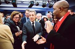 Nicolas Sarkozy recevant de nouveaux adhérents des Républicains, au siège du parti, le 9 janvier.   