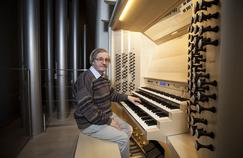 Michel Garnier in the gallery of the organ on which he worked for more than seven months.