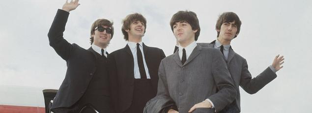 Les Beatles à l'aéroport de Londres, en 1964.