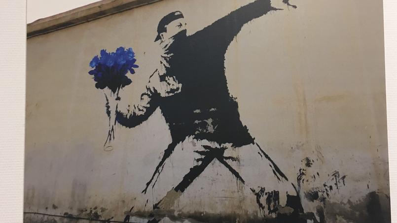 A démisuse of a work of Banksy, artist haé for migrants.