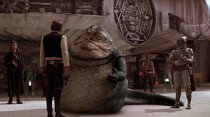 Jabba the Hutt face à his best enemy, Han Solo, in front of the Millennium Falcon.
