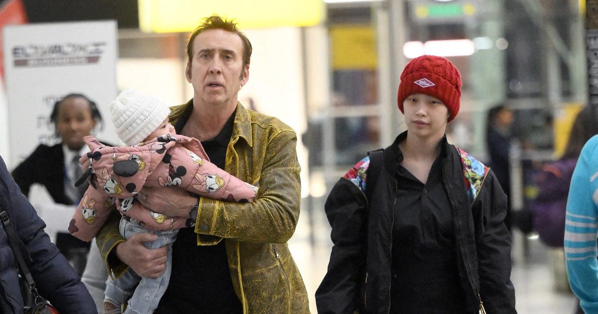 Nicolas Cage et sa jeune épouse Riko Shibata, immortalisés à l'aéroport de New York avec leur bébé de 7 mois