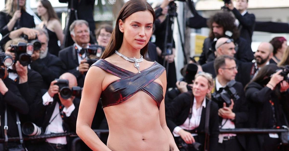 Her V-shaped abs and (almost) nothing else.  Irina Shayk’s muscle up in Cannes