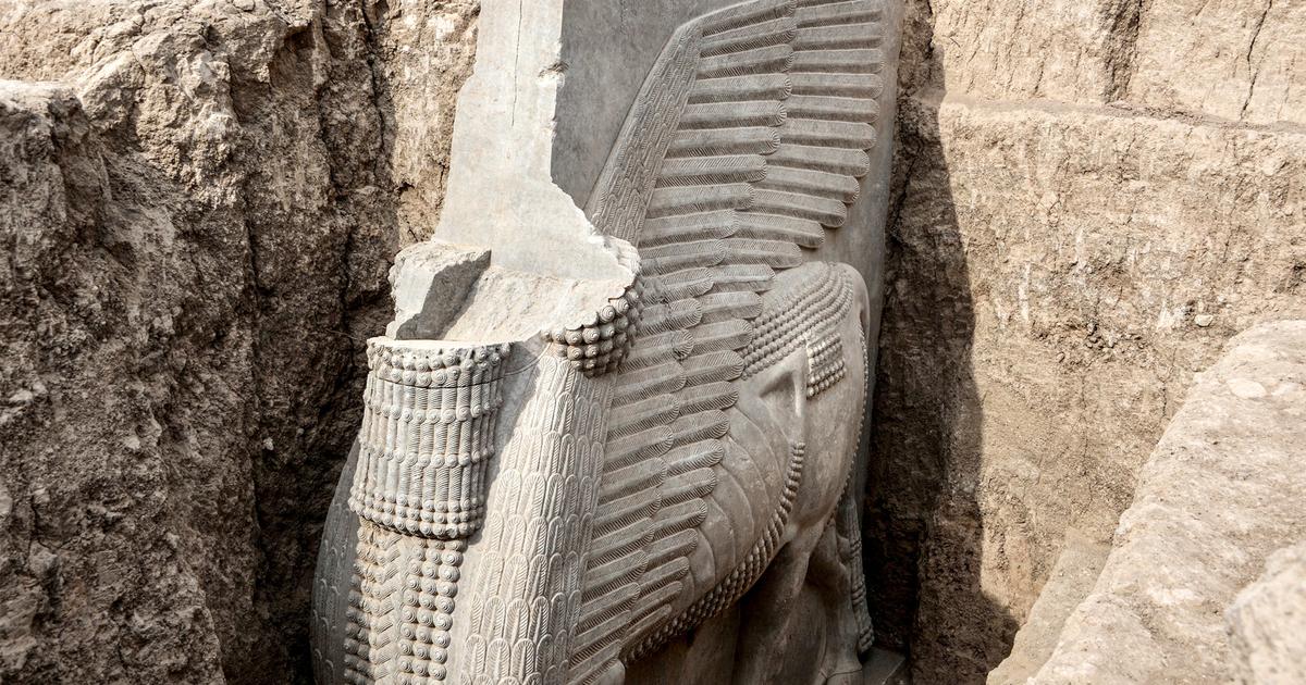 Huge 18-ton Assyrian winged bull unveiled by archaeologists in Iraq