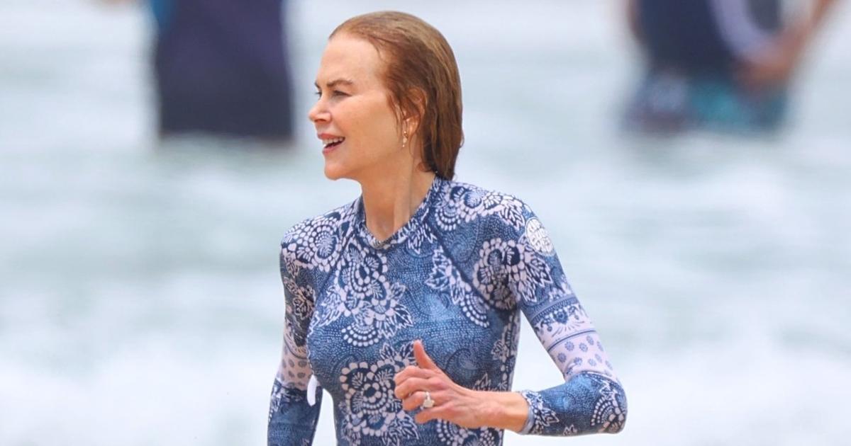 In Australia, Nicole Kidman swims in a sea jumpsuit with patterned sleeves