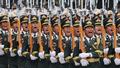 Les gardes d’honneur de l’Armée populaire de libération de la Chine (APL) défilent lors d’une cérémonie d’accueil pour le président russe Vladimir Poutine au Grand Hall du peuple à Pékin, en Chine, le 20 mai 2026.
