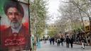 Des gens passent devant des affiches du nouveau guide suprême de l’Iran, Mojtaba Khamenei, affichées le long d’une rue à Ispahan, en Iran, le 24 mars 2026.