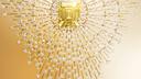 Collier Monsieur Fred Golden Light serti du fameux Soleil d’Or, le diamant jaune de plus de 100 carats de Fred.