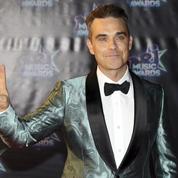 Deux Banksy de la collection de Robbie Williams s'arrachent à coups de millions à Londres