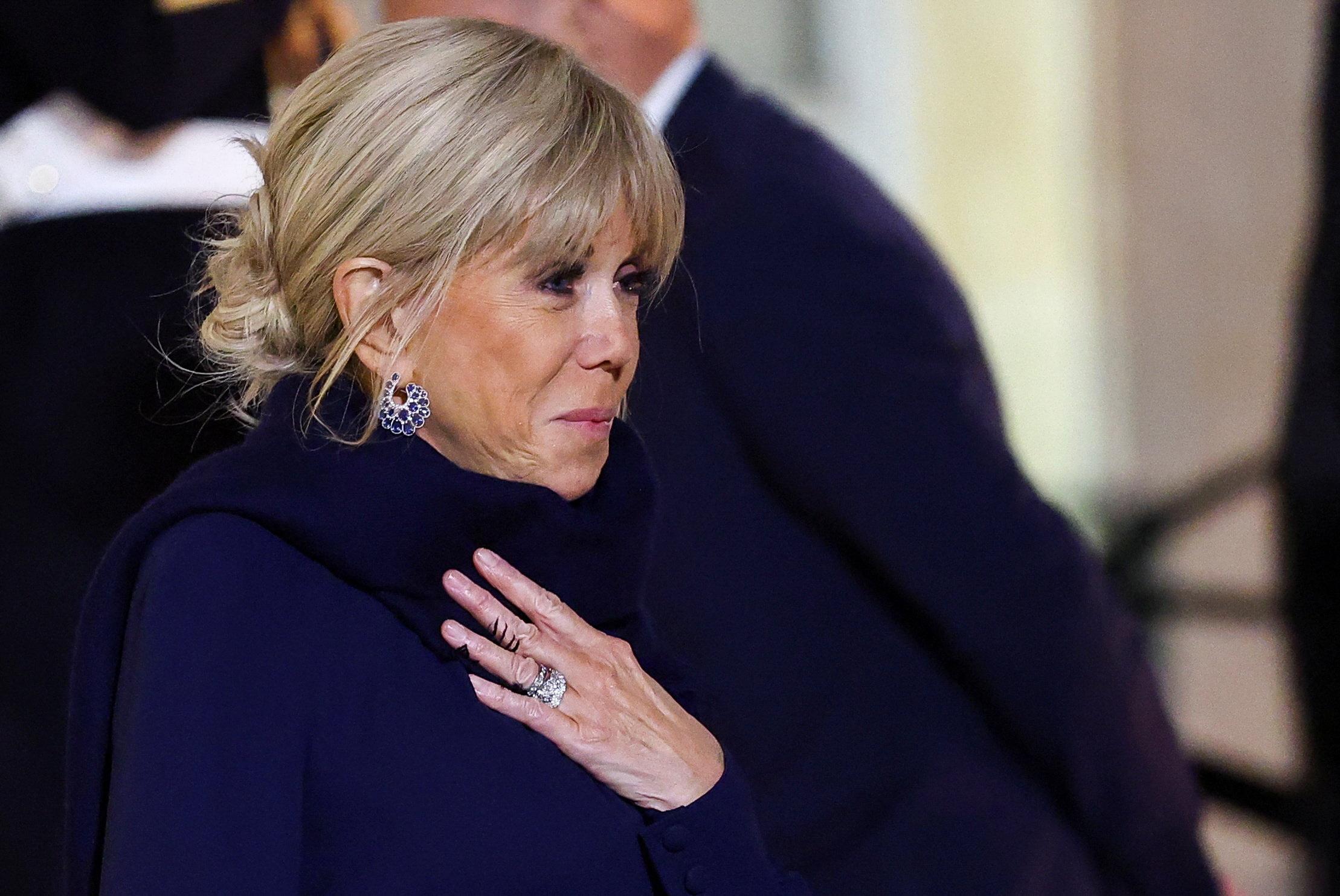 Government Defends Brigitte Macron Amidst 'Sales Connes' Controversy