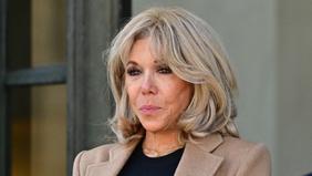 PHOTOS - Au Salon du Livre, Brigitte Macron, très élégante en long