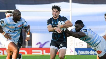 Hugo Reus (balle en main) lors du match de Montpellier contre le Racing 92.