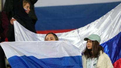8397405 23.03.2023 Russia's fans hold Russian flags before the friendly soccer match between Iran and Russia at the Azadi Stadium in Tehran, Iran. Alexander Vilf / Sputnik - Photo by Icon sport - Photo by Icon Sport