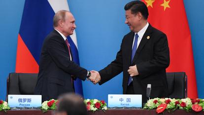 Vladimir Poutine et Xi Jinping lors du sommet de l’organisation de coopération de Shanghai, le 10 juin 2018.