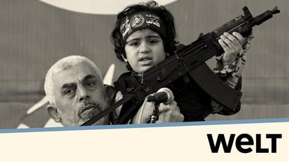 L’ex-chef du Hamas, Yahya Sinwar tenant son fils dans les bras avec un fusil Kalachnikov à la main, à Gaza le 24 mai 2021.