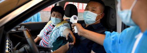 Coronavirus : dix nouveaux quartiers placés en quarantaine à Pékin