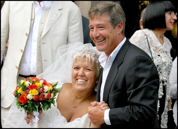 PHOTOS - Mimie Mathy : qui sont les hommes de sa vie ?