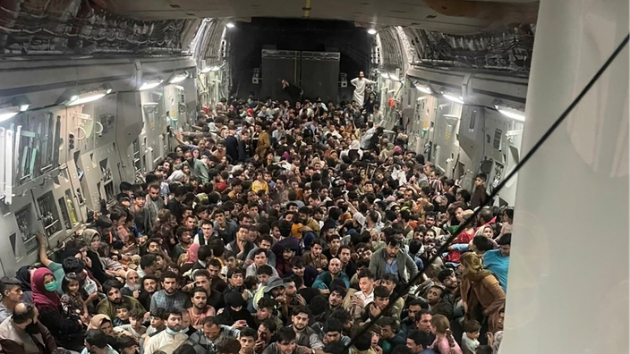 Some 640 people boarded an American C-17.