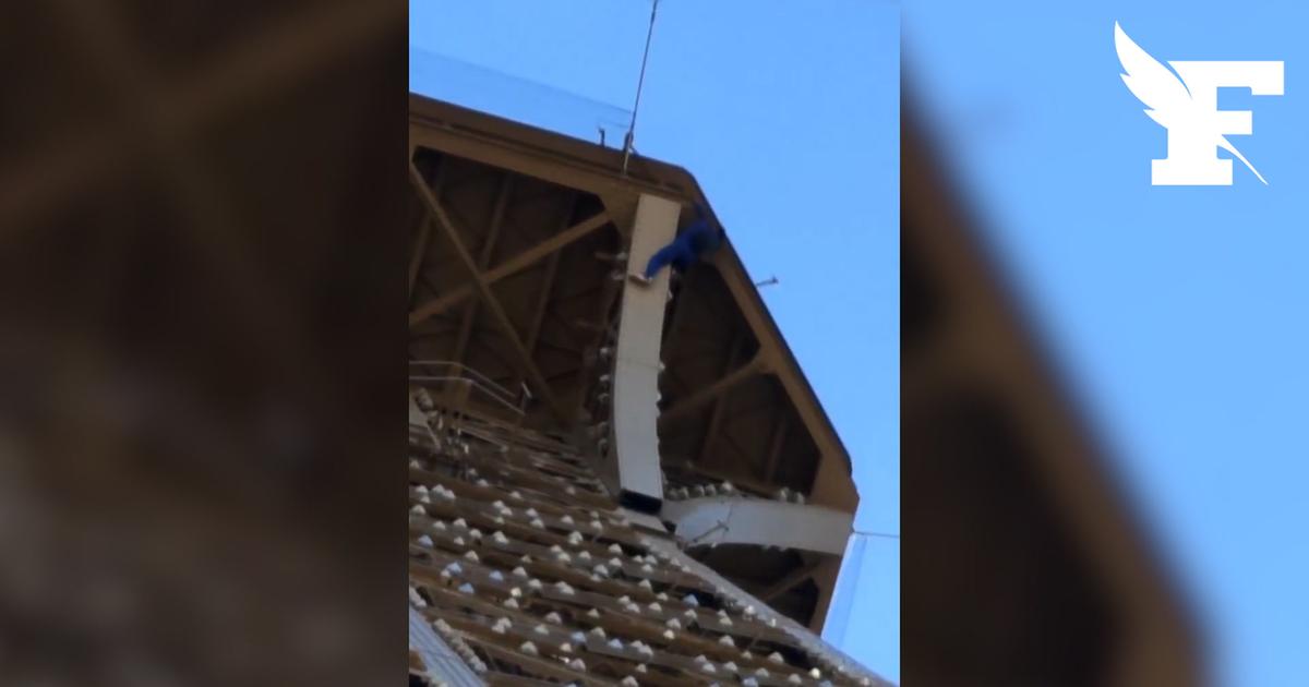 En images : un homme a escaladé la tour Eiffel et y a accroché un drapeau américain