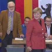 Les allemands se rendent aux urnes pour des élections législatives jouées d'avance