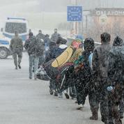À la frontière avec l'Autriche, un flux ordonné de migrants