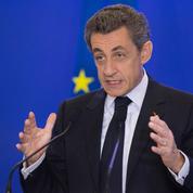 Sarkozy défend à Bruxelles son idée d'un nouveau traité