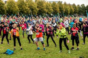 Happy collective warm-up Nordic walking in Lyon.