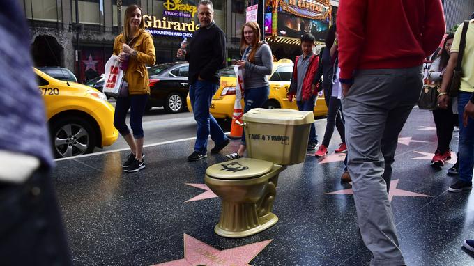  Toilets covered with golden paint, above Donald Trump's star 
