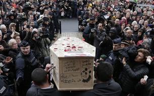 Les funérailles des dessinateurs de<i> Charlie Hebdo</i> 