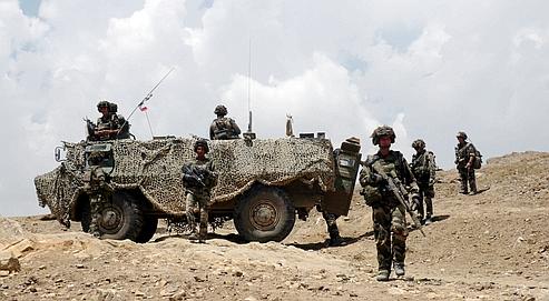 Des forces françaises patrouillent mardi dans le secteur de Kapisa.