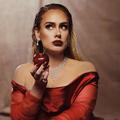 Adele en rouge passion goûte au fruit défendu dans le clip de "Oh My God"